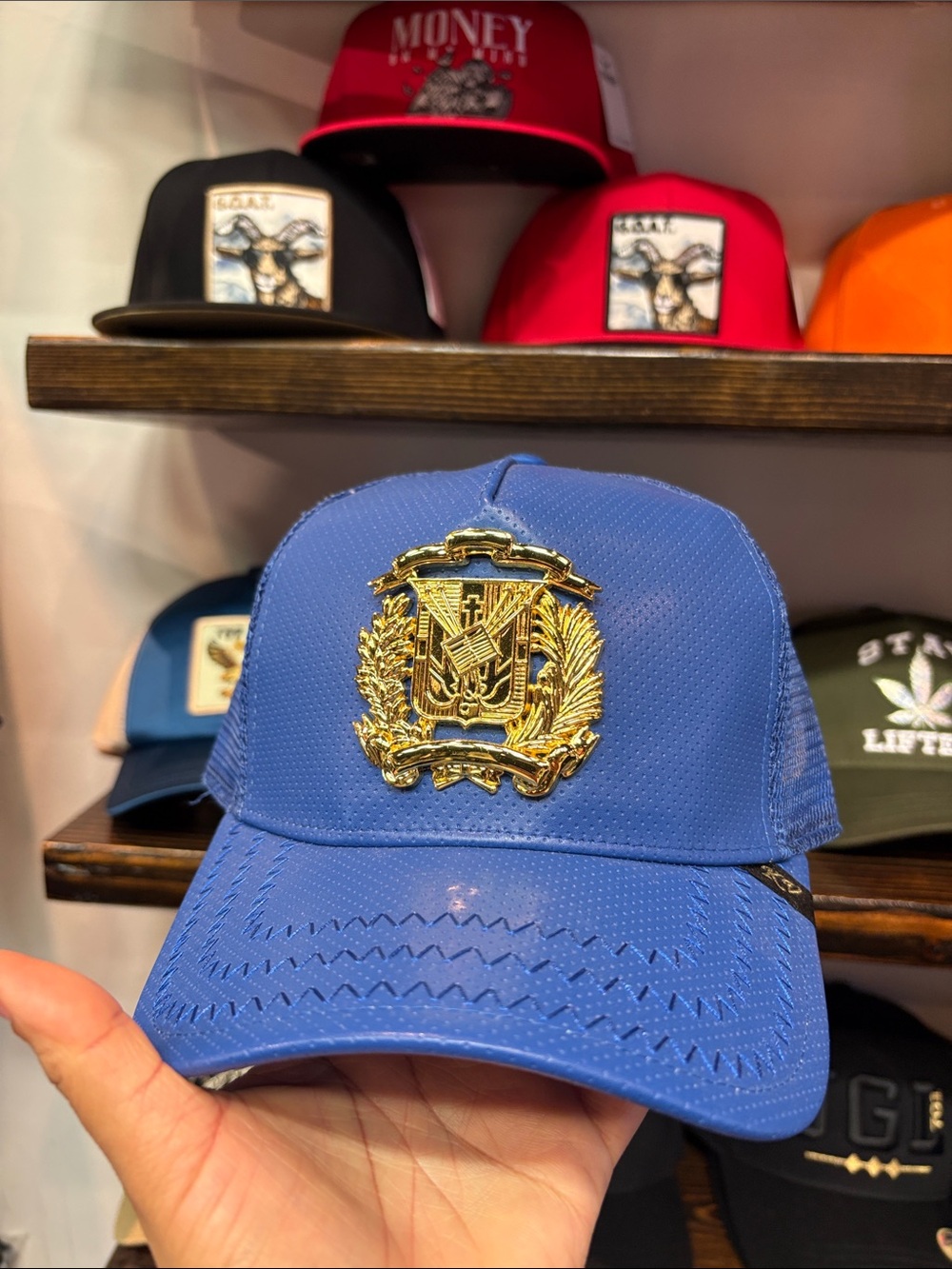 Blue Mesh Trucker Cap with Gold Crest Accent